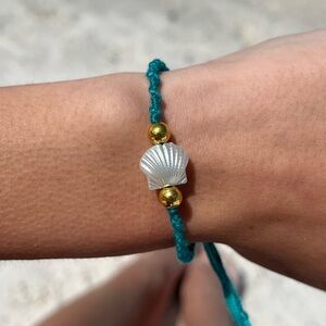Handmade woven teal pearl shell gold bead bracelet